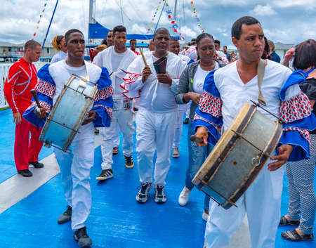 Cuban Musicians in traditional costumes perform for tourists, Santa Maria, Santa Clara, Cuba, spring 2018のeditorial素材
