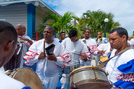 Cuban Musicians in traditional costumes perform for tourists, Santa Maria, Santa Clara, Cuba, spring 2018のeditorial素材