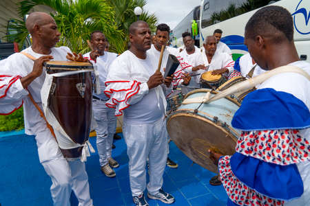 Cuban Musicians in traditional costumes perform for tourists, Santa Maria, Santa Clara, Cuba, spring 2018のeditorial素材