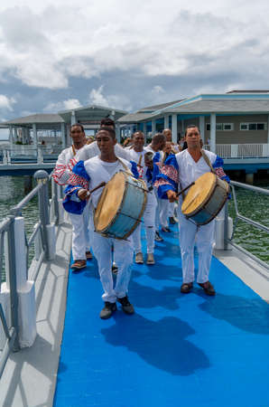 Cuban Musicians in traditional costumes perform for tourists, Santa Maria, Santa Clara, Cuba, spring 2018のeditorial素材