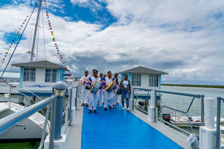 Cuban Musicians in traditional costumes perform for tourists, Santa Maria, Santa Clara, Cuba, spring 2018のeditorial素材