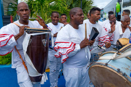 Cuban Musicians in traditional costumes perform for tourists, Santa Maria, Santa Clara, Cuba, spring...