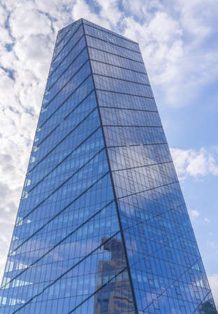 Modern skyscraper office or apartment building in Istanbul Turkey. blue sky, wide angle. March 2021のeditorial素材
