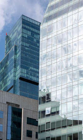 Modern skyscraper office or apartment building in Istanbul Turkey. blue sky, wide angle. March 2021