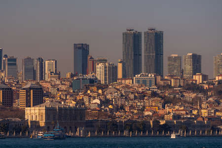 Istanbul cityscape, skyscrapers and Dolmabahce Palace view from Bosporus strait. March 2021のeditorial素材