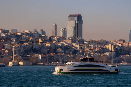 Istanbul cityscape, skyscrapers and Golden Horn Metro Bridge. March 2021のeditorial素材