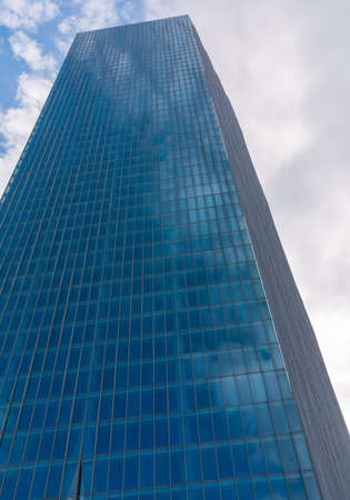 Modern skyscraper office or apartment building in Istanbul Turkey. blue sky, wide angle. March 2021