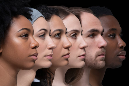 Diverse group of young adults showcasing unique features, representing different backgrounds against a dark backdrop.の素材