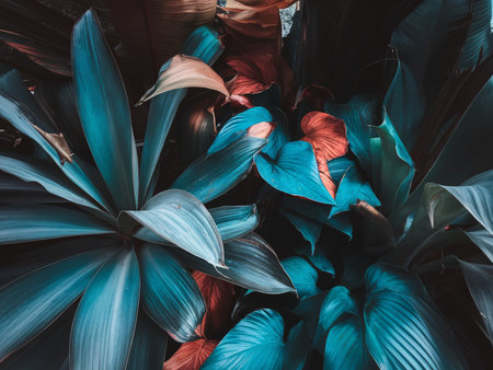 Vibrant tropical foliage in rich blue and red hues, creating a serene and lush atmosphere.の素材