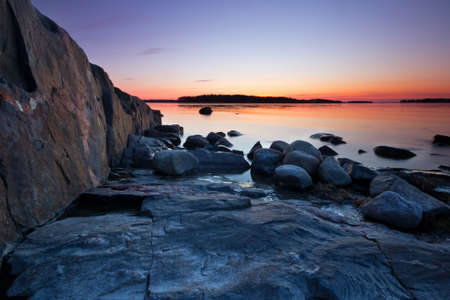 Beach rocks in early spring morningの写真素材