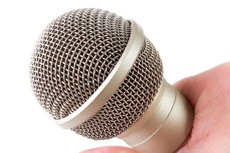 Audio microphone closeup, isolated on whiteの写真素材