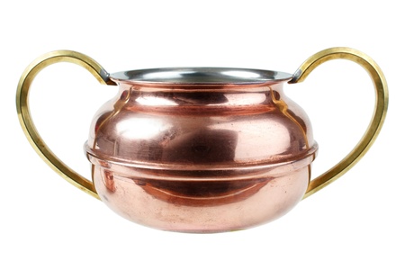 Old copper cup, tinned inside, isolated on whiteの写真素材