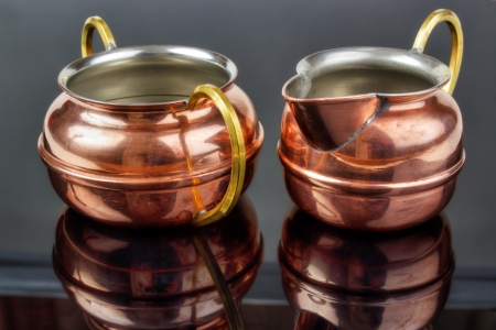 Old copper cup and jug , tin plated insideの写真素材