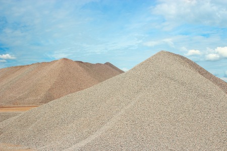 Sand heaps in gravel quarry construction の写真素材
