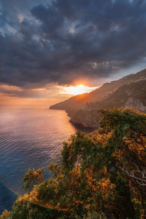 Golden hour over the sea in Conca dei Marini, Amalfi Coast, Italyの写真素材