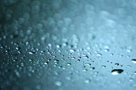 Raindrops on glass, selective focus.