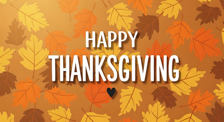 A festive "Happy Thanksgiving" message is superimposed on a background of scattered autumn leaves in warm hues of orange, yellow, and brown, evoking a sense of warmth and the fall season.の素材