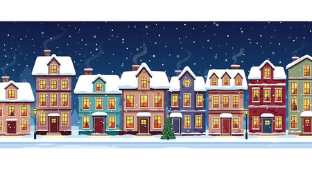 A picturesque winter scene depicts a row of colorful, multi-story houses with glowing windows and snow-covered roofs under a starry, dark blue sky with falling snowflakes.の素材
