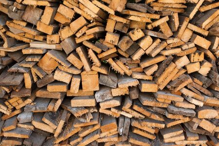 Pile of old firewood background