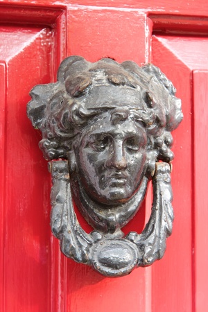 Door knocker with red door  Dublin  Irelandの写真素材