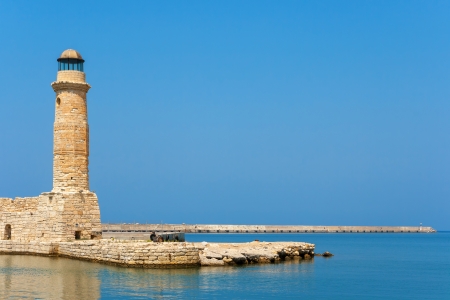 Old venetian lighthouse at the harbor. Rethymno, Crete, Greeceの写真素材