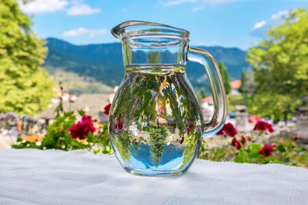 Traditional jug of water on a table. Metsovo, Epirus, Greeceの写真素材