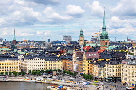 STOCKHOLM, SWEDEN - JULY 08, 2017: Spires of German Church and Stockholm Cathedral rises above the rooftops of the Gamla Stanのeditorial素材