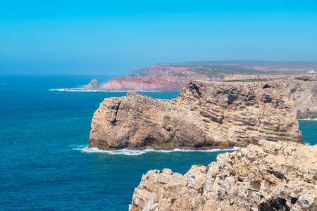 Rocky atlantic coastline at the south west point of mainland Europe. Cape Sao Vicente, Sagres, Algarve, Portugalの写真素材