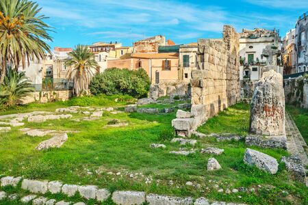 Ruins ancient Doric Temple of Apollo in Ortigia island. Syracuse, Sicily, Italyの写真素材