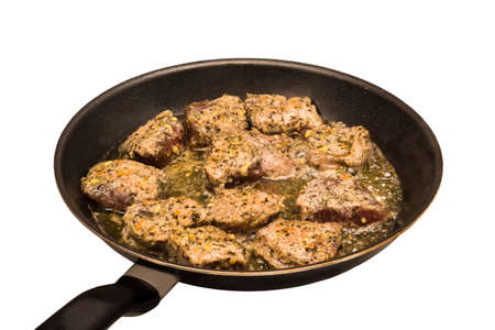 Meat in the pan Frying meat in deep oil. Fried meat with spices.の写真素材