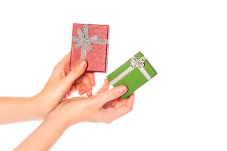 Gift box passed to the hands. A Christmas gift for other occasions. Image isolated from background....
