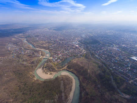 Russia, Krasnodar region, city of Apsheronsk and the river Pshekha. Drone photo.