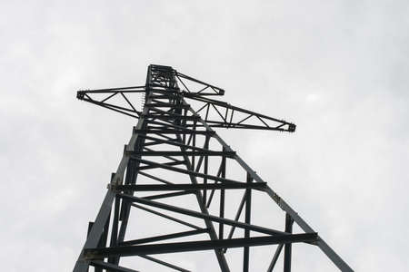 Abandoned high-voltage mast without wires. Russia.