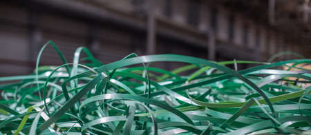 Waste green plastic packaging tape.の写真素材