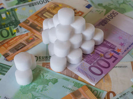 A stack of white cylindrical pillets on the bills of the EU.