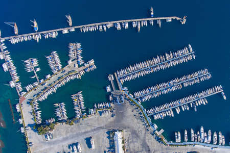 Top view of the large yacht marina. Aerial view by drone.
