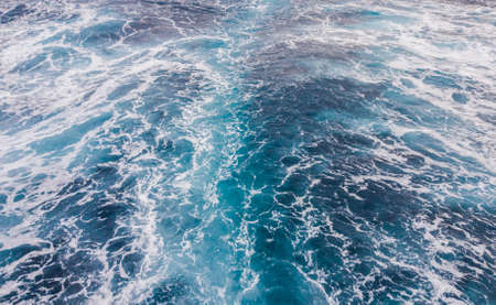 A Wake behind a ship on the sea surface.の写真素材