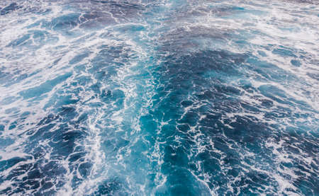 A Wake behind a ship on the sea surface.