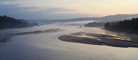 Aerial panoramic view of foggy morning on the riverの素材