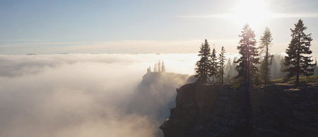 Panoramic view from the top of the mountain in the fogの素材