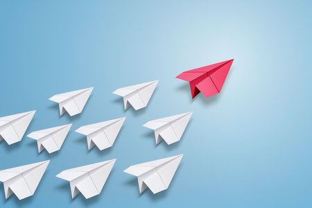 Paper plane leadership concept with white paper planes on blue background. Vector illustration.の素材