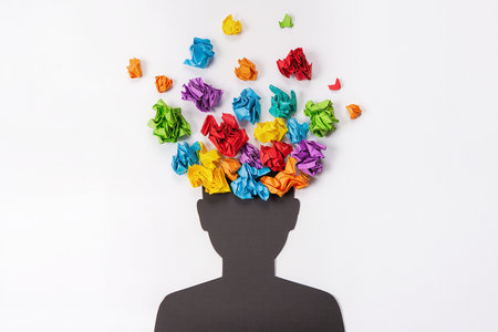 Silhouette of a man with crumpled paper as a symbol of creativityの素材