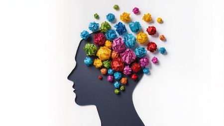 Human head with crumpled paper balls as a symbol of creativityの素材