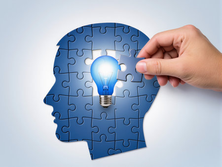 Human head with lightbulb on jigsaw puzzle piece, idea conceptの素材