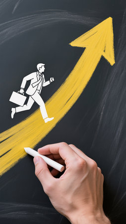 businessman going up on a chalkboard with a yellow arrow drawingの素材