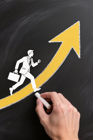 businessman running on a blackboard with a white arrow going upの素材