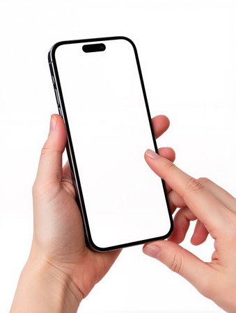 Female hands holding a smartphone with a white screen on a white backgroundの素材