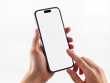 female hands holding a smartphone with a white screen on a white backgroundの素材