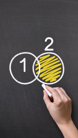 2021 new years resolutions written on blackboard with a white chalkの素材