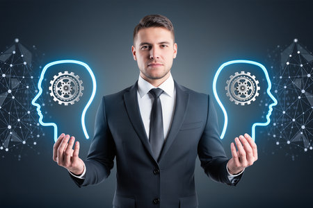 Portrait of a young businessman in a dark suit and tie on a dark blue background. The concept of artificial intelligence. Toned image double exposureの素材